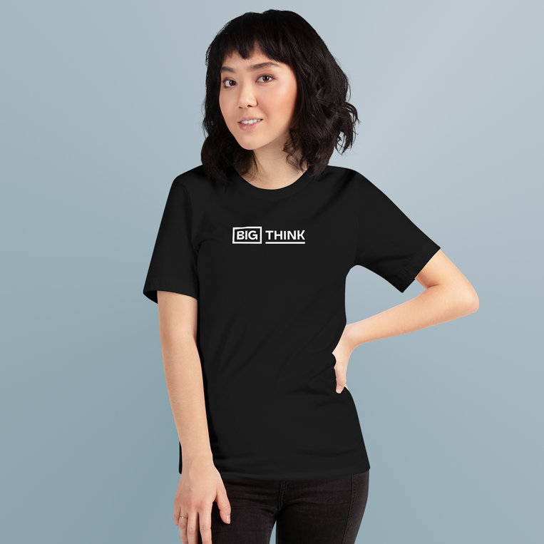 Person wearing a black t-shirt with 'BIG THINK' text on a plain background